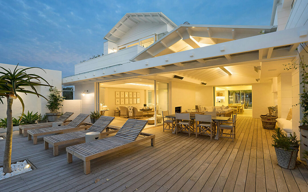Beach house Photo by Greg Rivers on Unsplash